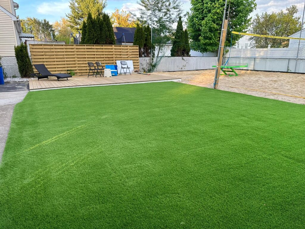 How does artificial turf compare to natural grass in terms of sustainability?